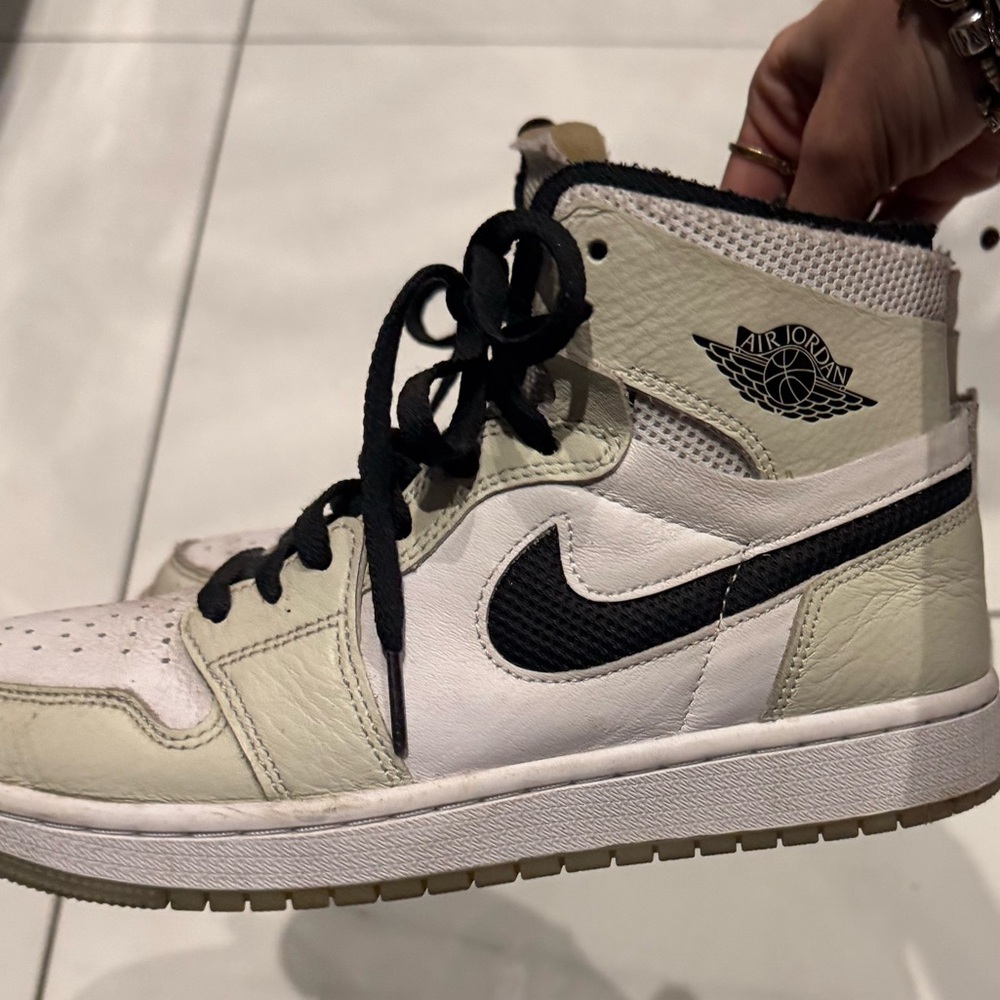 Nike Air Jordan 1 High Cream and Black Sneakers